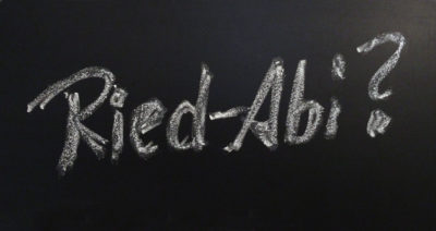 Tafel mit Kreideschriftzug "Ried-Abi?"